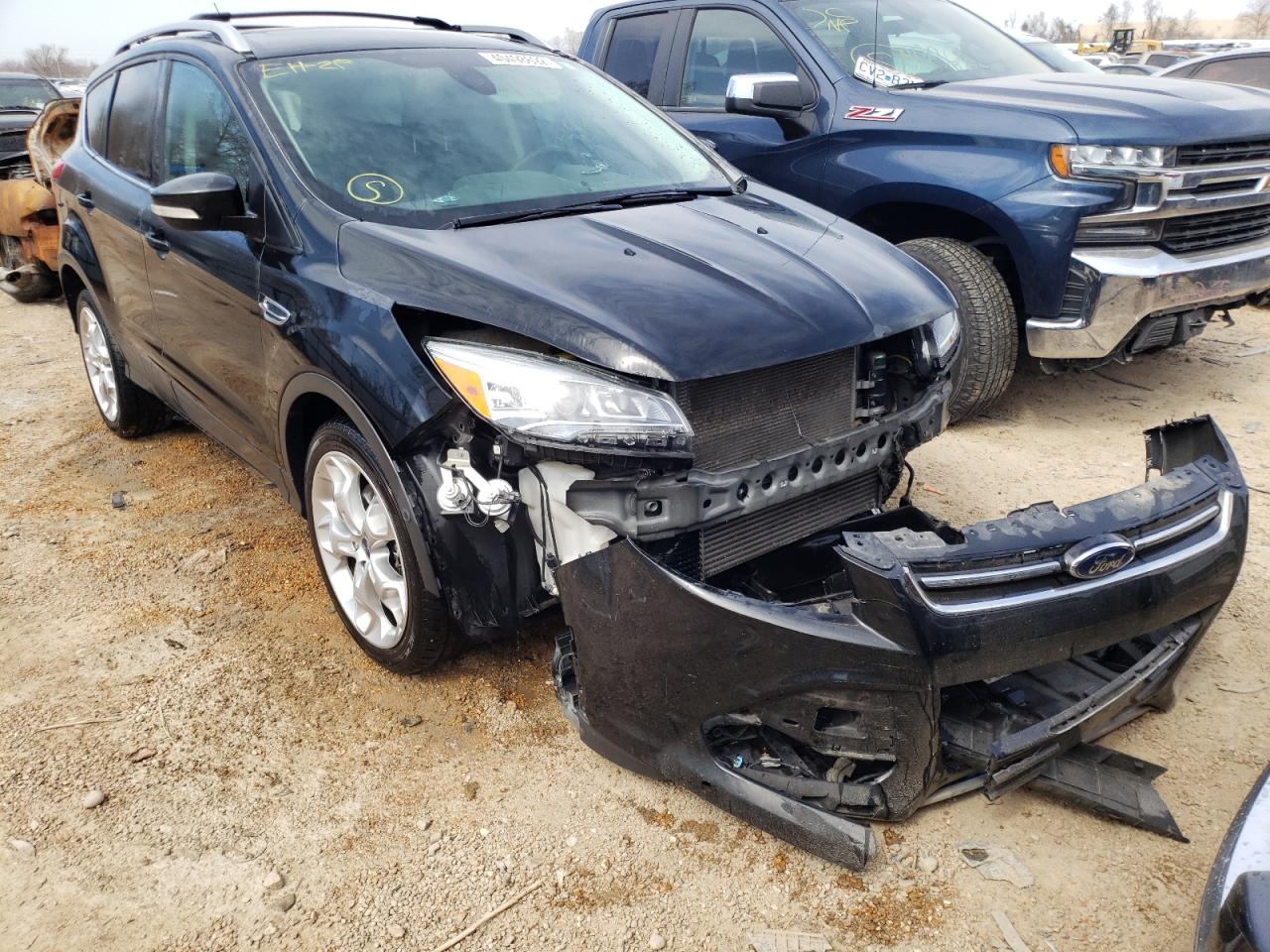 FORD ESCAPE TIT 2013 with VIN 1FMCU0J98DUD23897 - Photo from auction