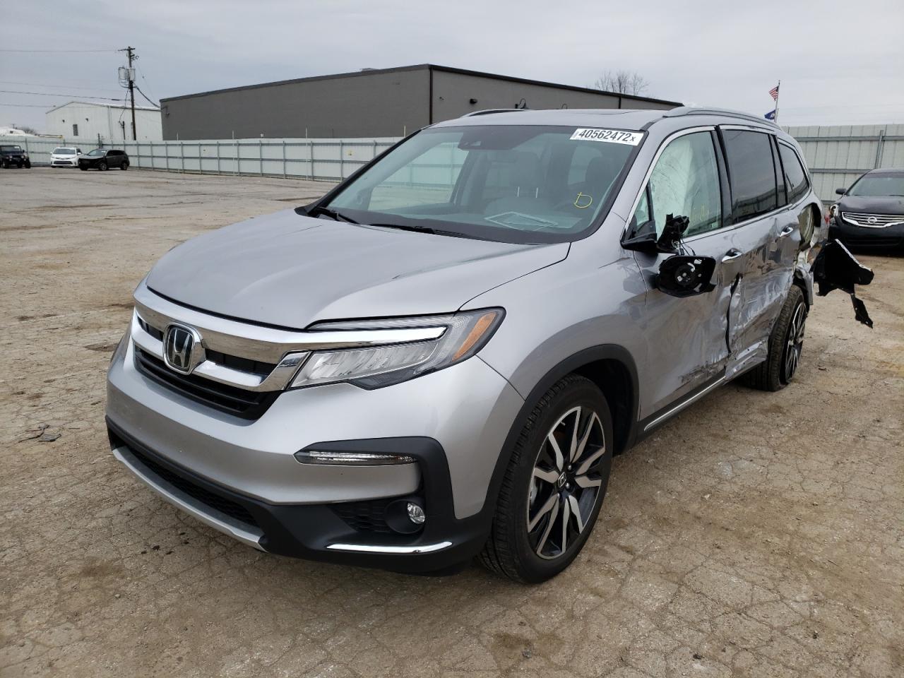 Photo 2 from auction – 2021 HONDA PILOT ELIT with VIN 5FNYF6H09MB072931