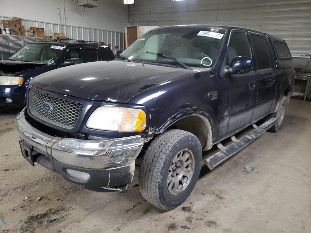 Photo 2 from auction – 2001 FORD F150 SUPER with VIN 1FTRW08L01KE61984