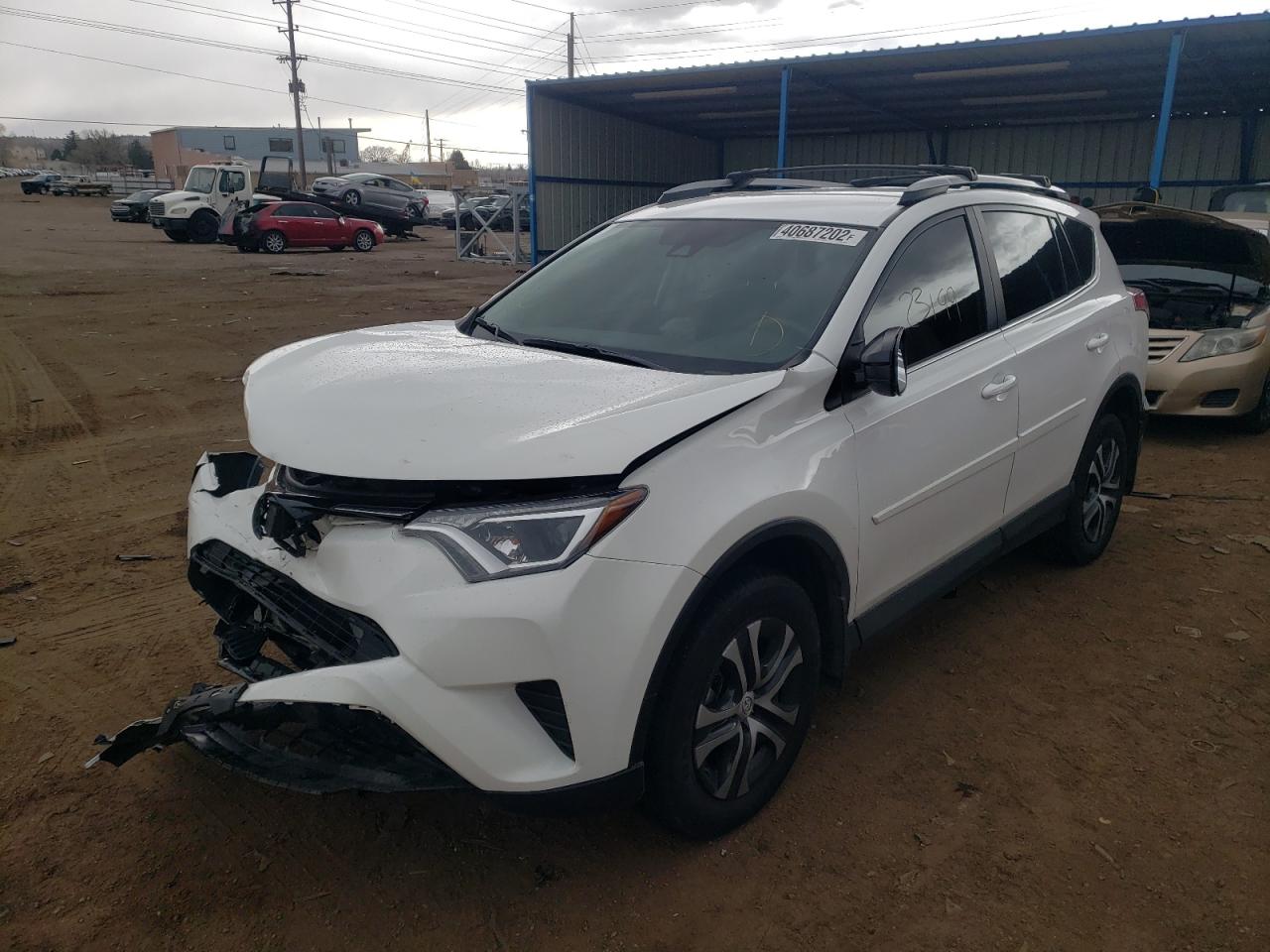 Photo 2 from auction – 2018 TOYOTA RAV4 LE with VIN 2T3BFREV0JW786721