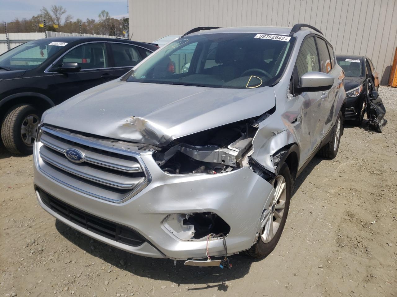 Photo 2 from auction – 2017 FORD ESCAPE SE with VIN 1FMCU0G96HUB73477
