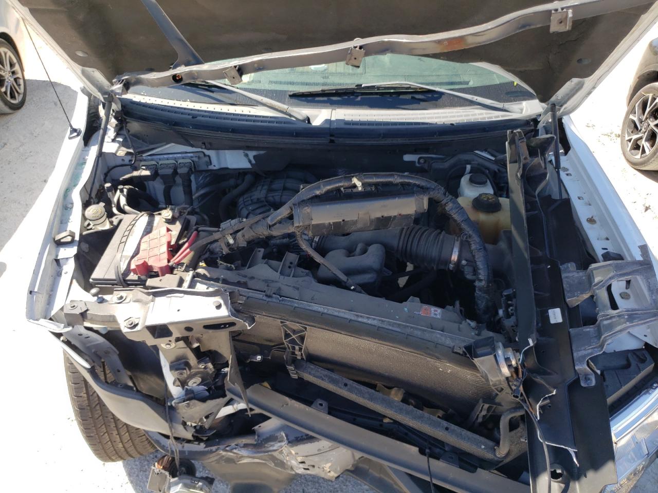 Photo 7 from auction – 2011 FORD F150 with VIN 1FTMF1EM6BKD76744