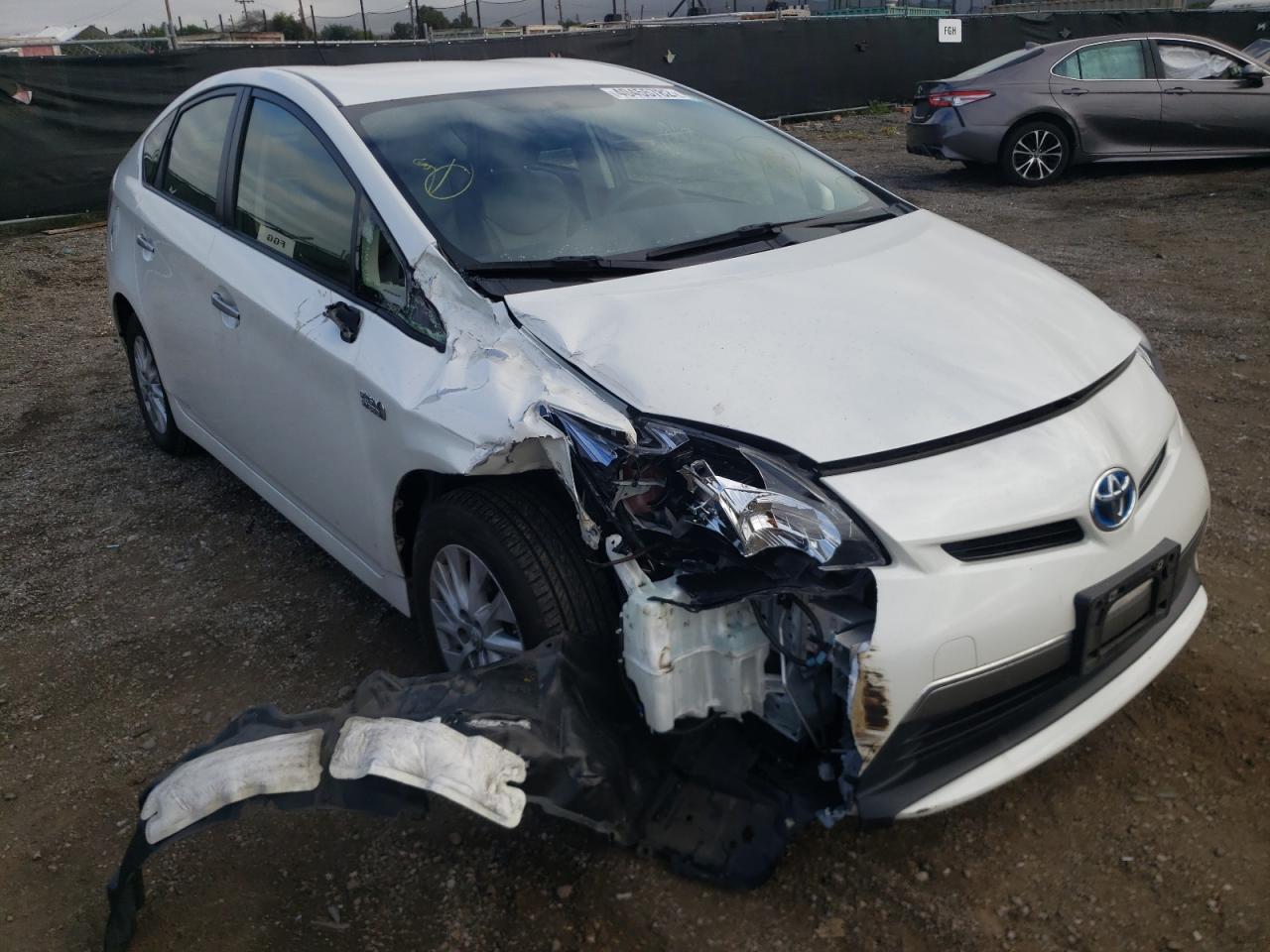 TOYOTA PRIUS PLUG 2014 with VIN JTDKN3DP0E3054343 - Photo from auction