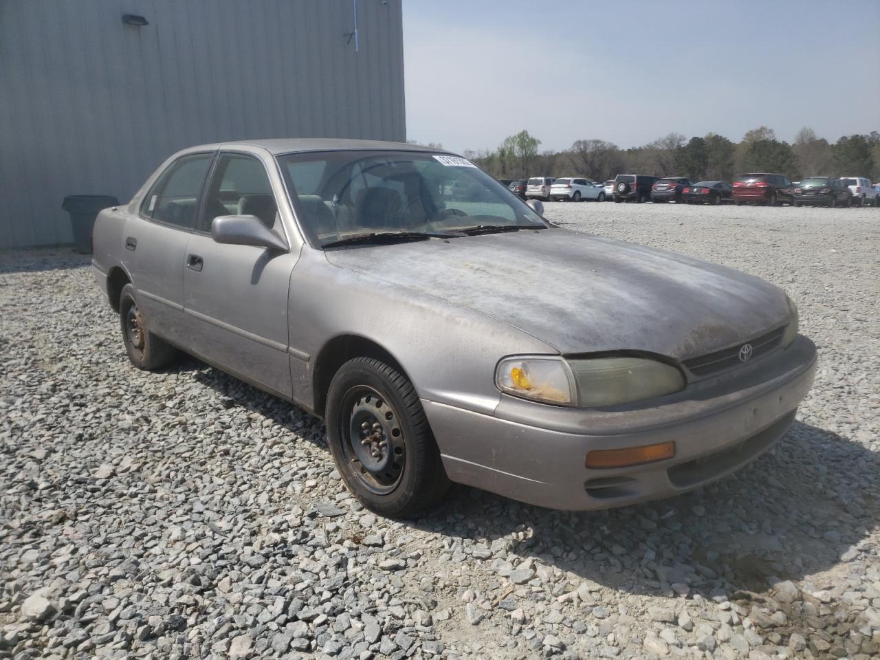 TOYOTA CAMRY LE 1995 with VIN 4T1SK12E5SU648958 - Photo from auction