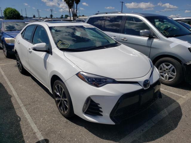 TOYOTA COROLLA L 2017 with VIN 5YFBURHE0HP659828 - Photo from auction