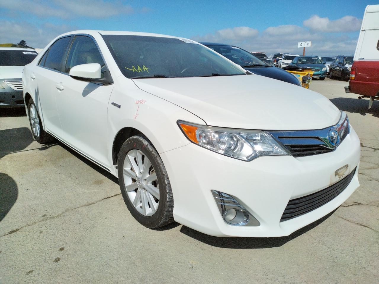 TOYOTA CAMRY HYBR 2012 with VIN 4T1BD1FK7CU026017 - Photo from auction