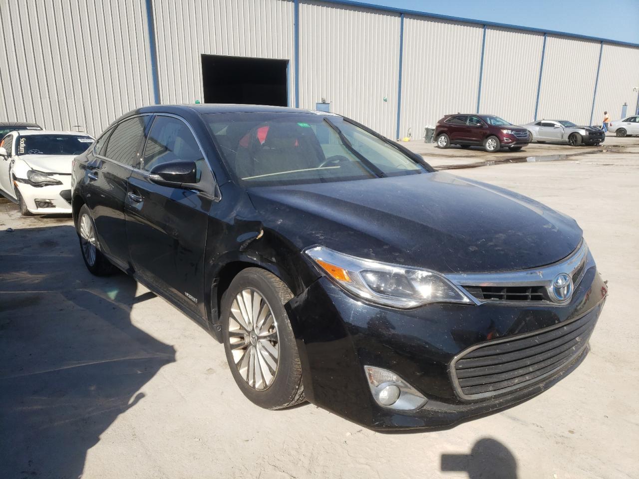 TOYOTA AVALON HYB 2015 with VIN 4T1BD1EB7FU044734 - Photo from auction
