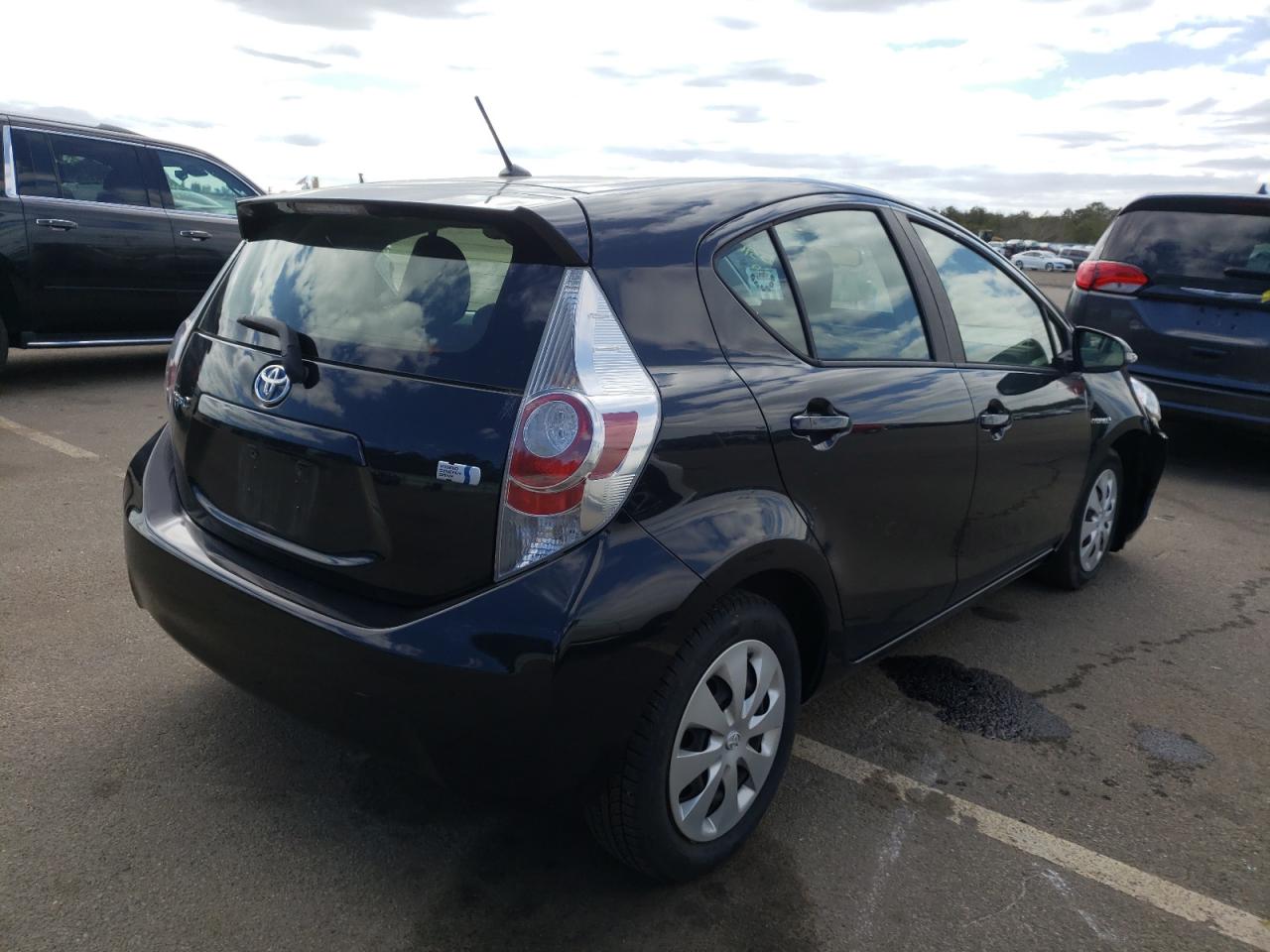 Photo 4 from auction – 2014 TOYOTA PRIUS C with VIN JTDKDTB34E1573989