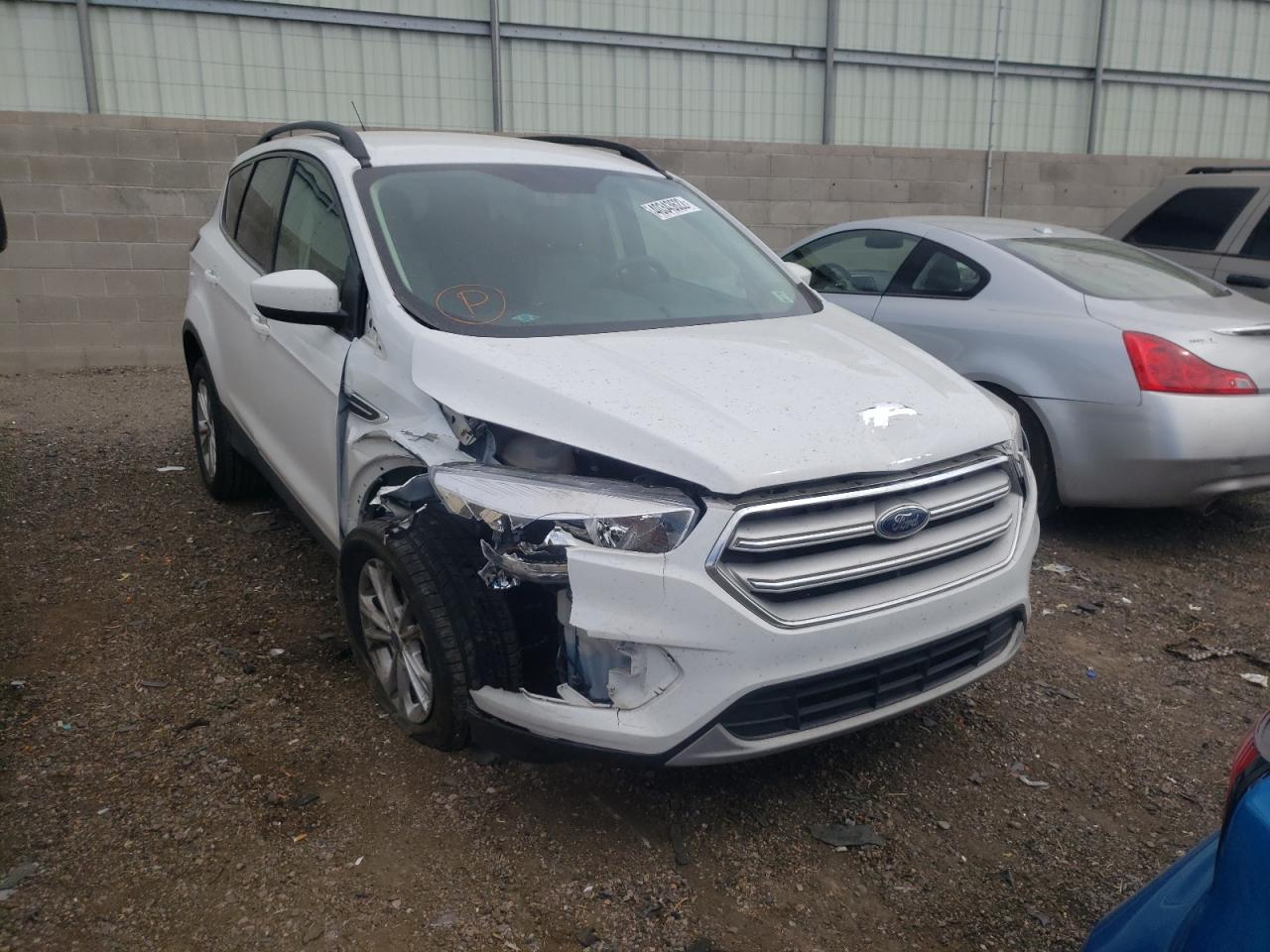 Photo 9 from auction – 2018 FORD ESCAPE SE with VIN 1FMCU9GDXJUD33990
