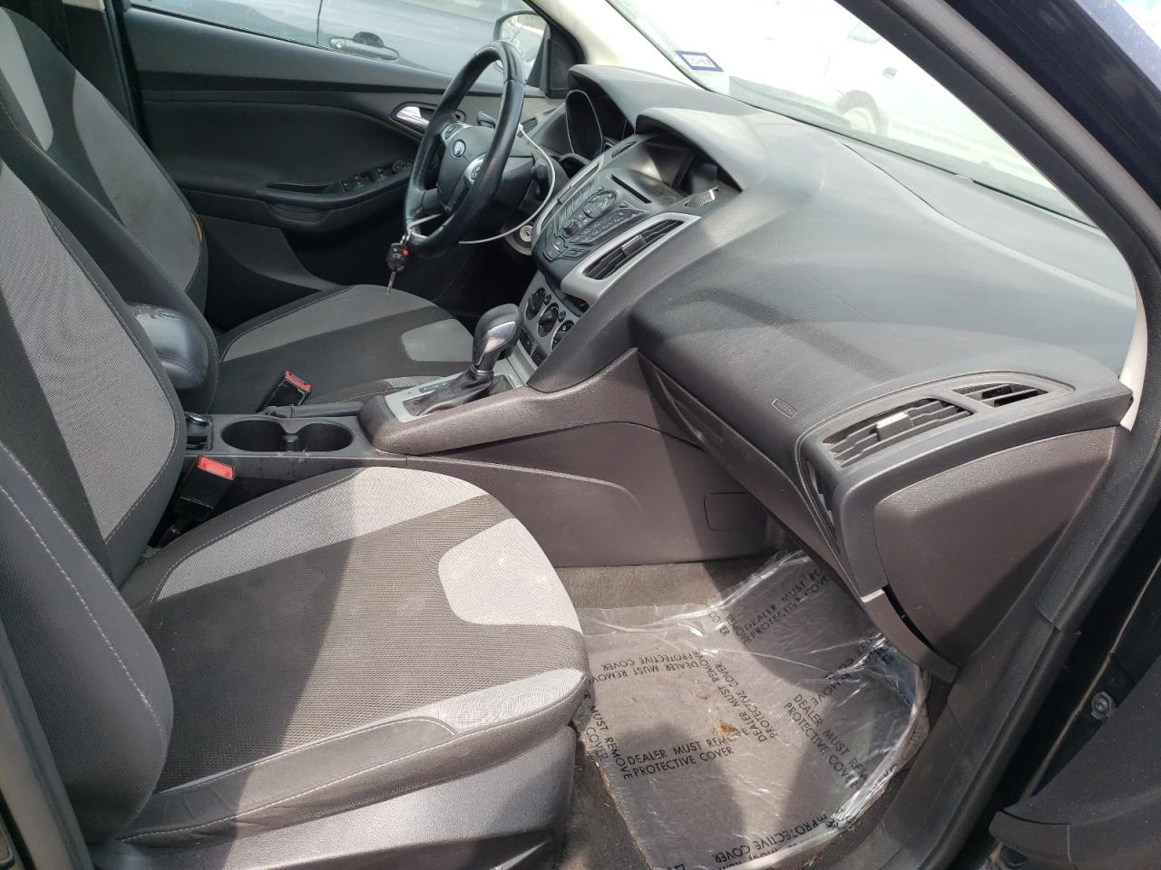 Photo 5 from auction – 2014 FORD FOCUS SE with VIN 1FADP3F23EL368014