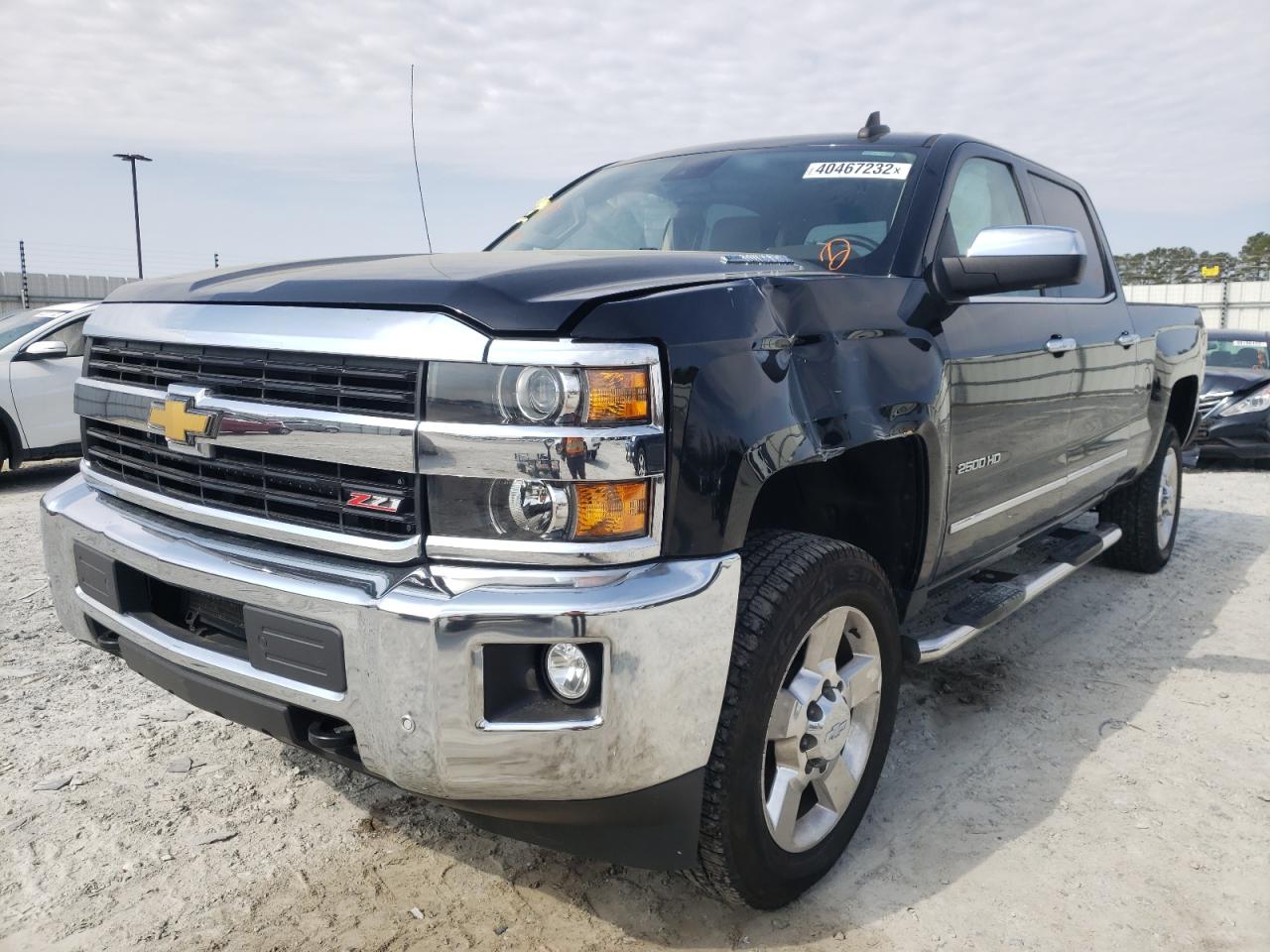 Photo 2 from auction – 2016 CHEVROLET SILVERADO with VIN 1GC1KWE8XGF228871