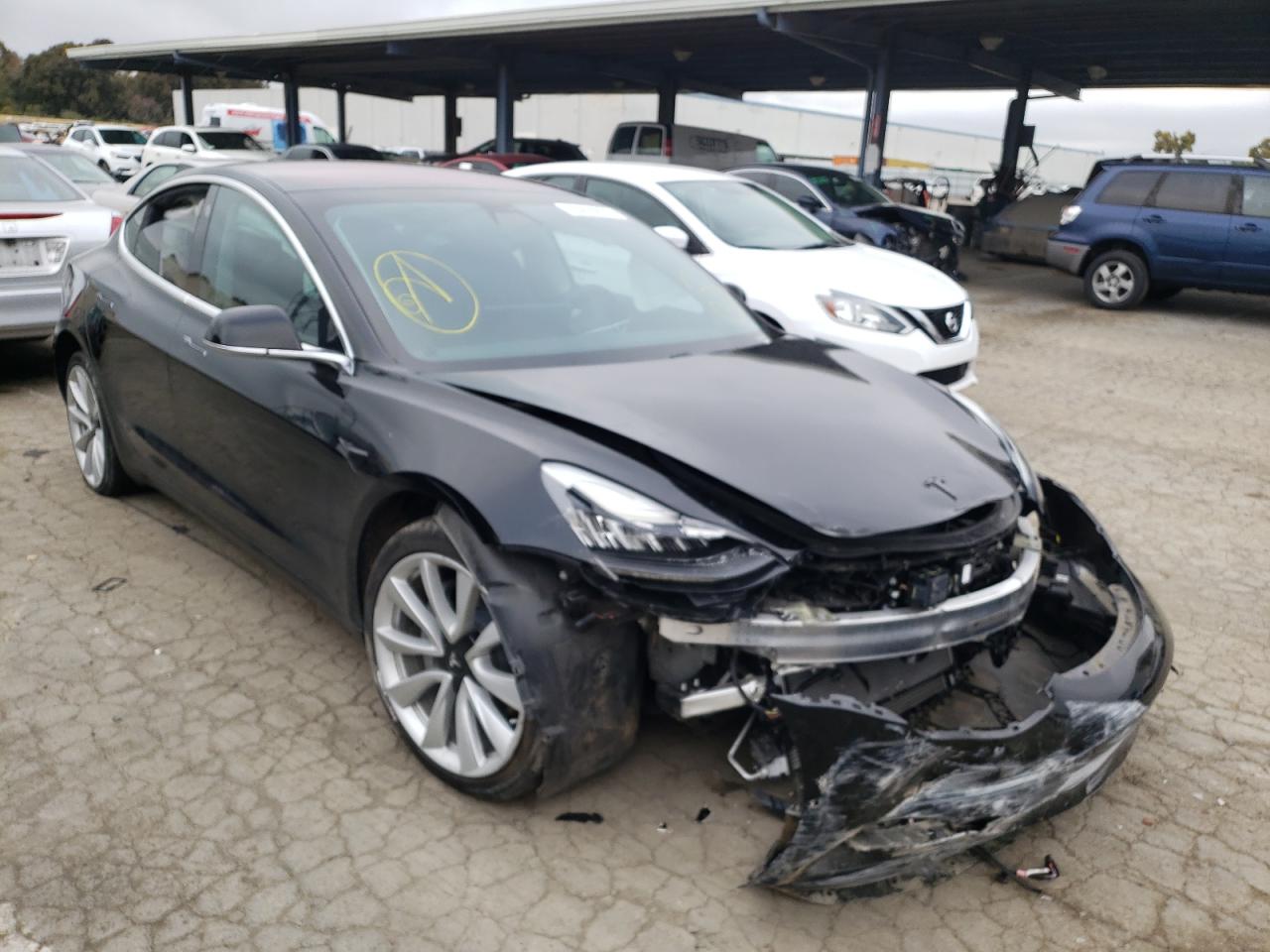 TESLA MODEL 3 2018 with VIN 5YJ3E1EA5JF176177 - Photo from auction
