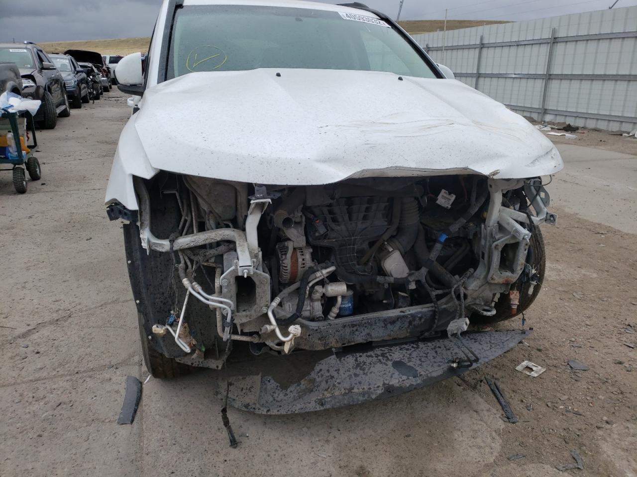 Photo 9 from auction – 2014 JEEP COMPASS LA with VIN 1C4NJDEB5ED727445