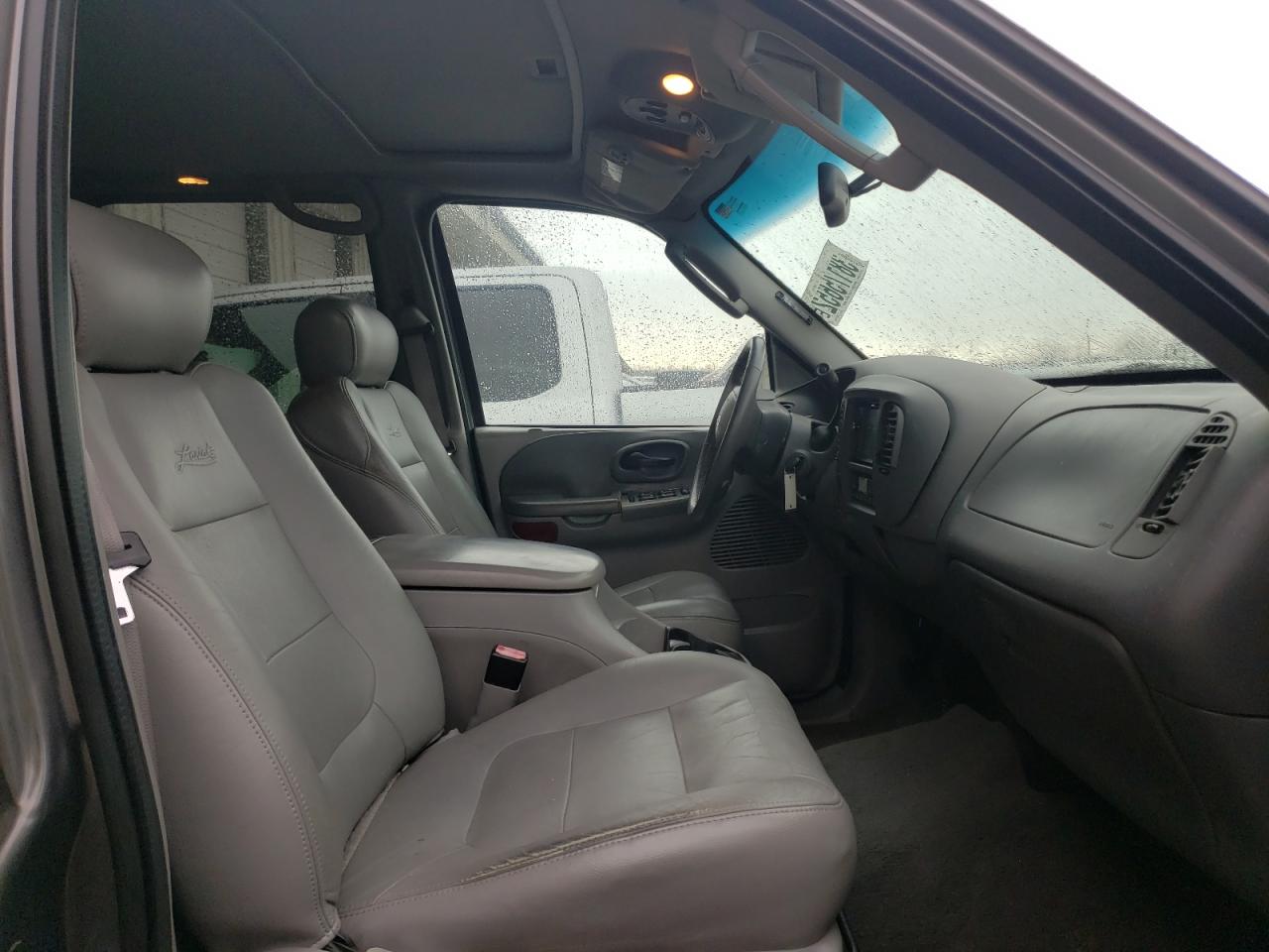 Photo 5 from auction – 2003 FORD F150 SUPER with VIN 1FTRW08643KD93220