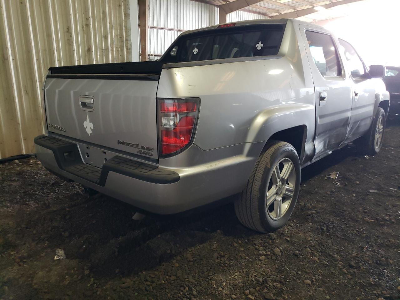 Photo 4 from auction – 2012 HONDA RIDGELINE with VIN 5FPYK1F5XCB004219