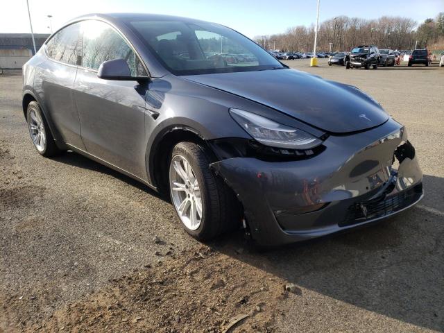 TESLA MODEL Y 2021 with VIN 5YJYGDEE6MF099974 - Photo from auction
