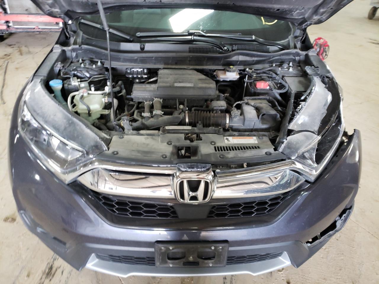 Photo 7 from auction – 2018 HONDA CR-V EX with VIN 7FARW2H53JE045491