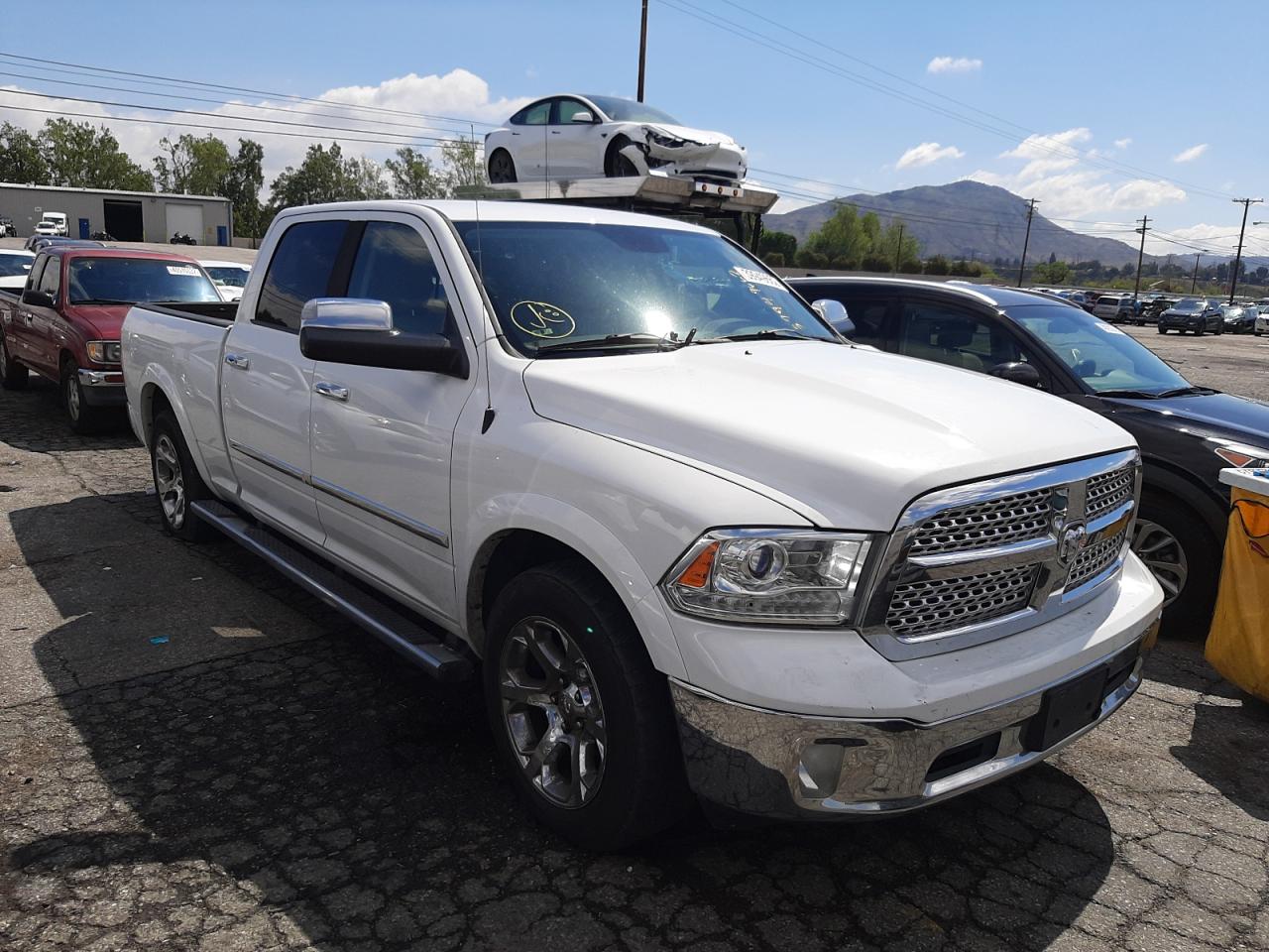 RAM 1500 LARAM 2014 with VIN 1C6RR7VM0ES387167 - Photo from auction