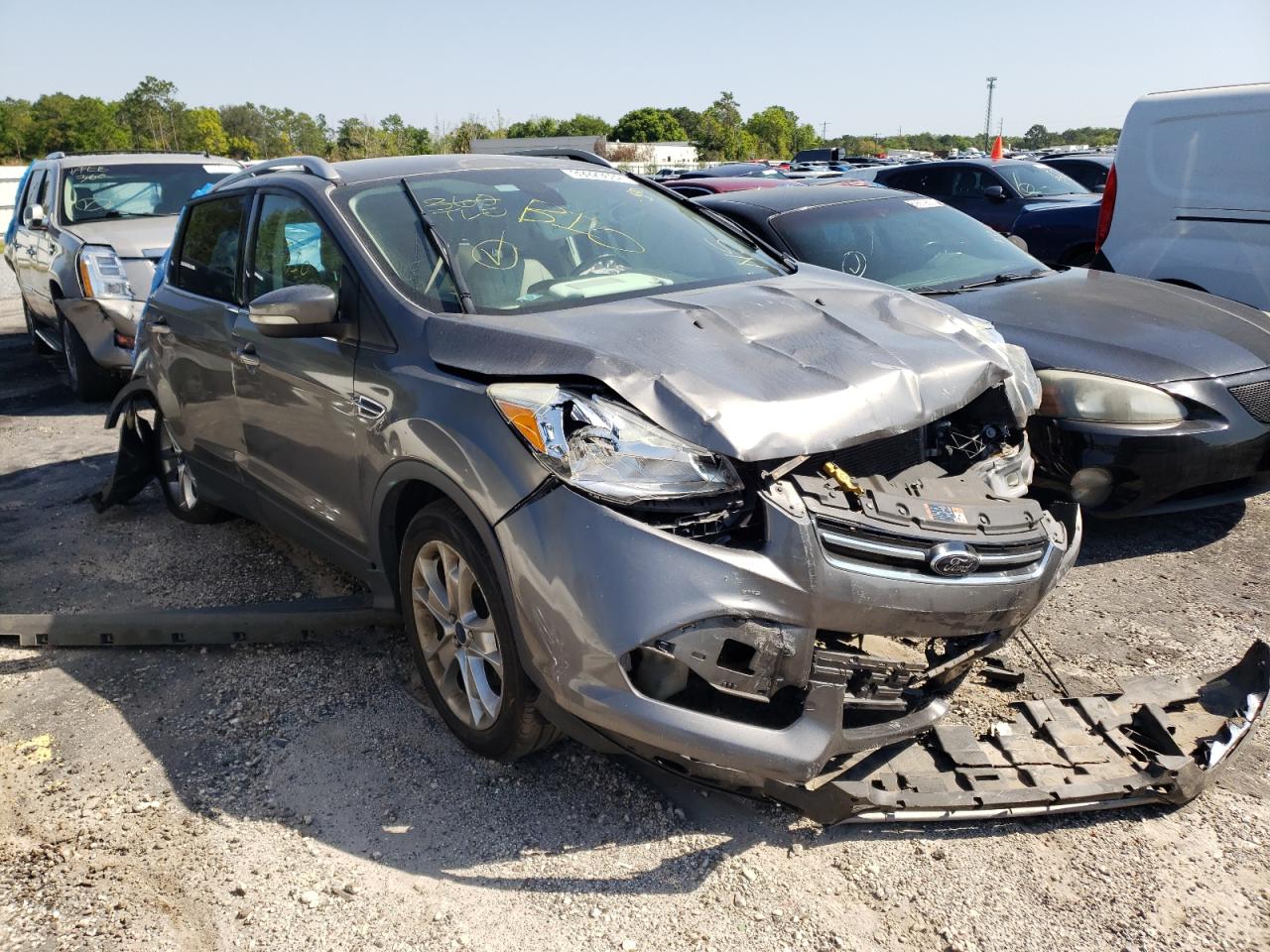FORD ESCAPE TIT 2014 with VIN 1FMCU9J96EUC21830 - Photo from auction