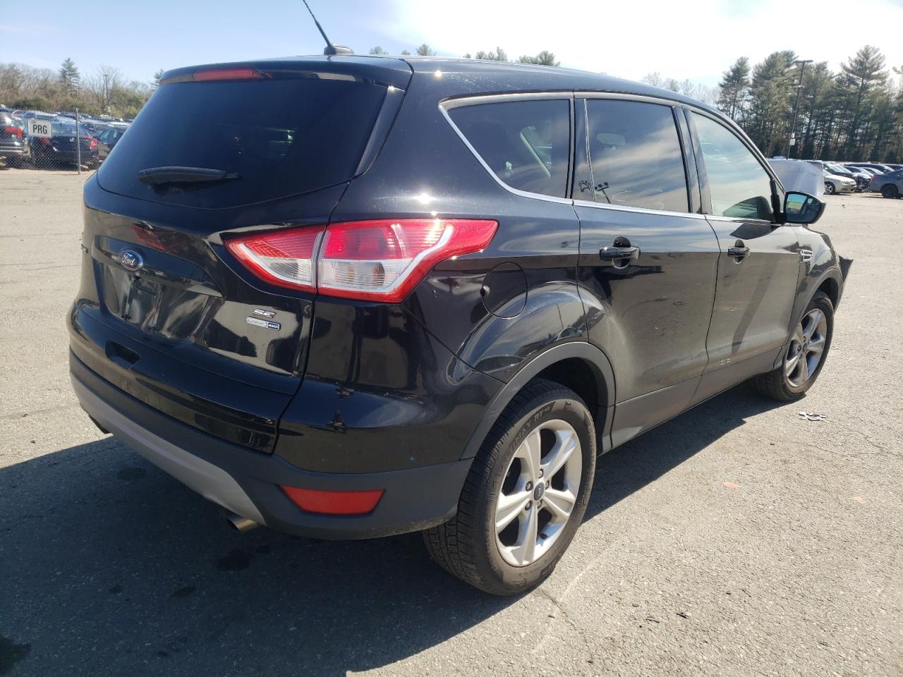 Photo 4 from auction – 2016 FORD ESCAPE SE with VIN 1FMCU9GX9GUA48359
