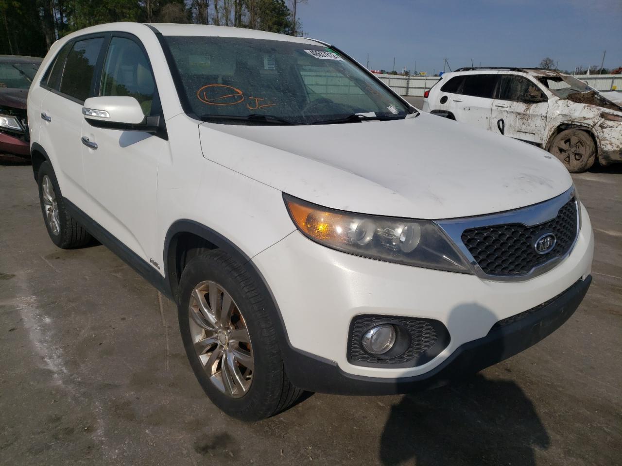 KIA SORENTO EX 2011 with VIN 5XYKUDA28BG011636 - Photo from auction