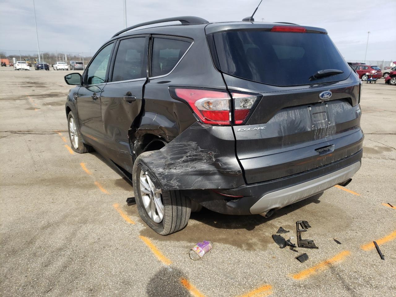 Photo 3 from auction – 2018 FORD ESCAPE SE with VIN 1FMCU0GD1JUA62152