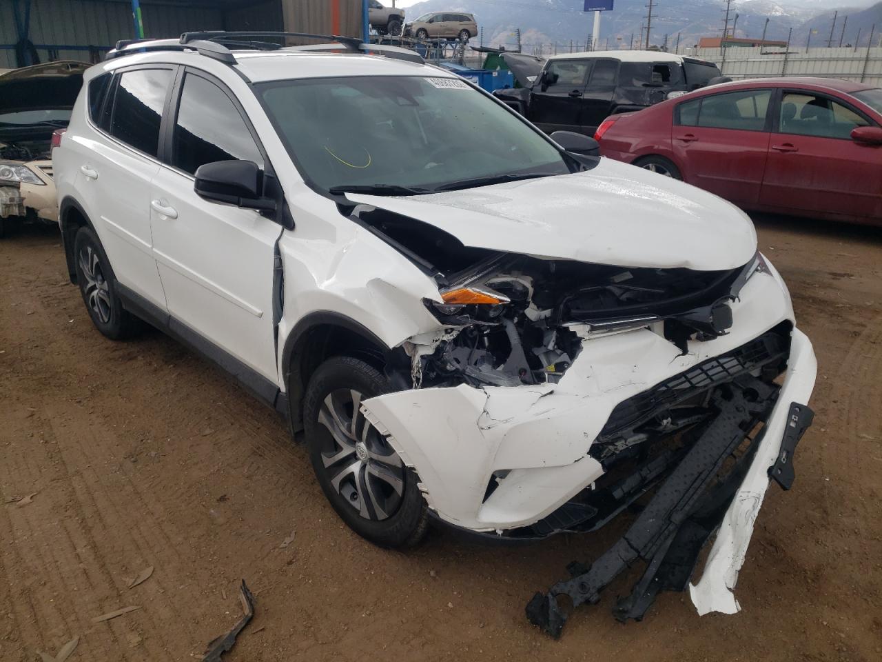 TOYOTA RAV4 LE 2018 with VIN 2T3BFREV0JW786721 - Photo from auction