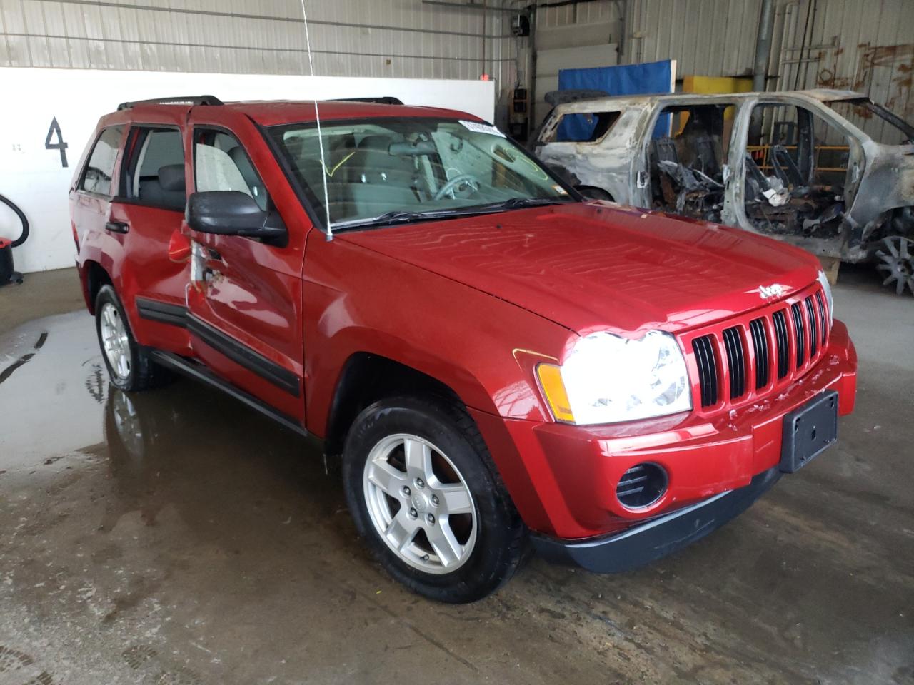 JEEP GRAND CHER 2005 with VIN 1J4GR48K75C560809 - Photo from auction