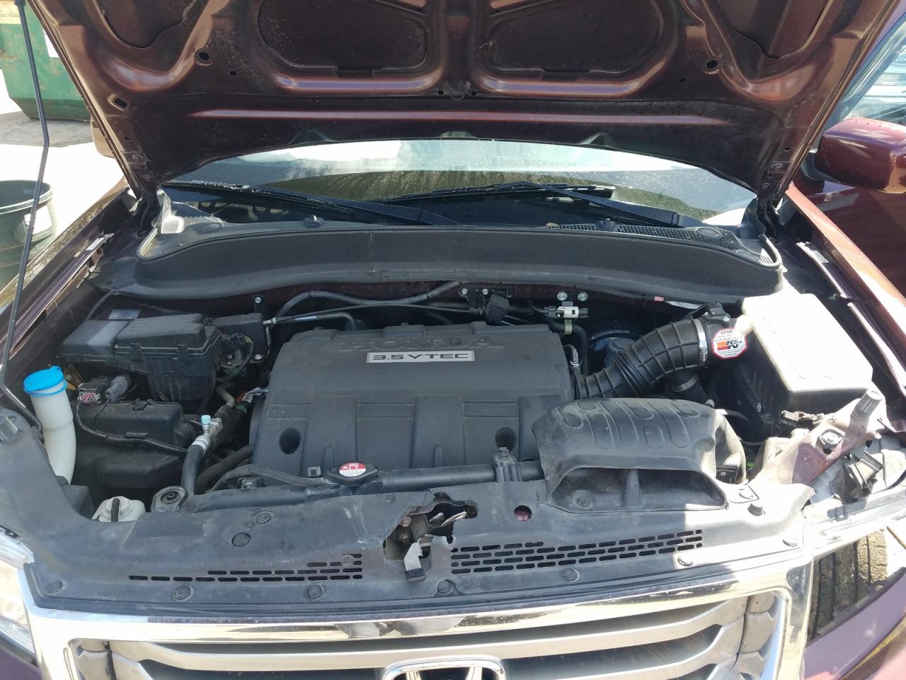 Photo 7 from auction – 2013 HONDA RIDGELINE with VIN 5FPYK1F59DB015746