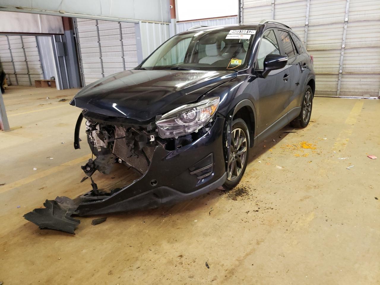 Photo 2 from auction – 2016 MAZDA CX-5 GT with VIN JM3KE4DYXG0707125