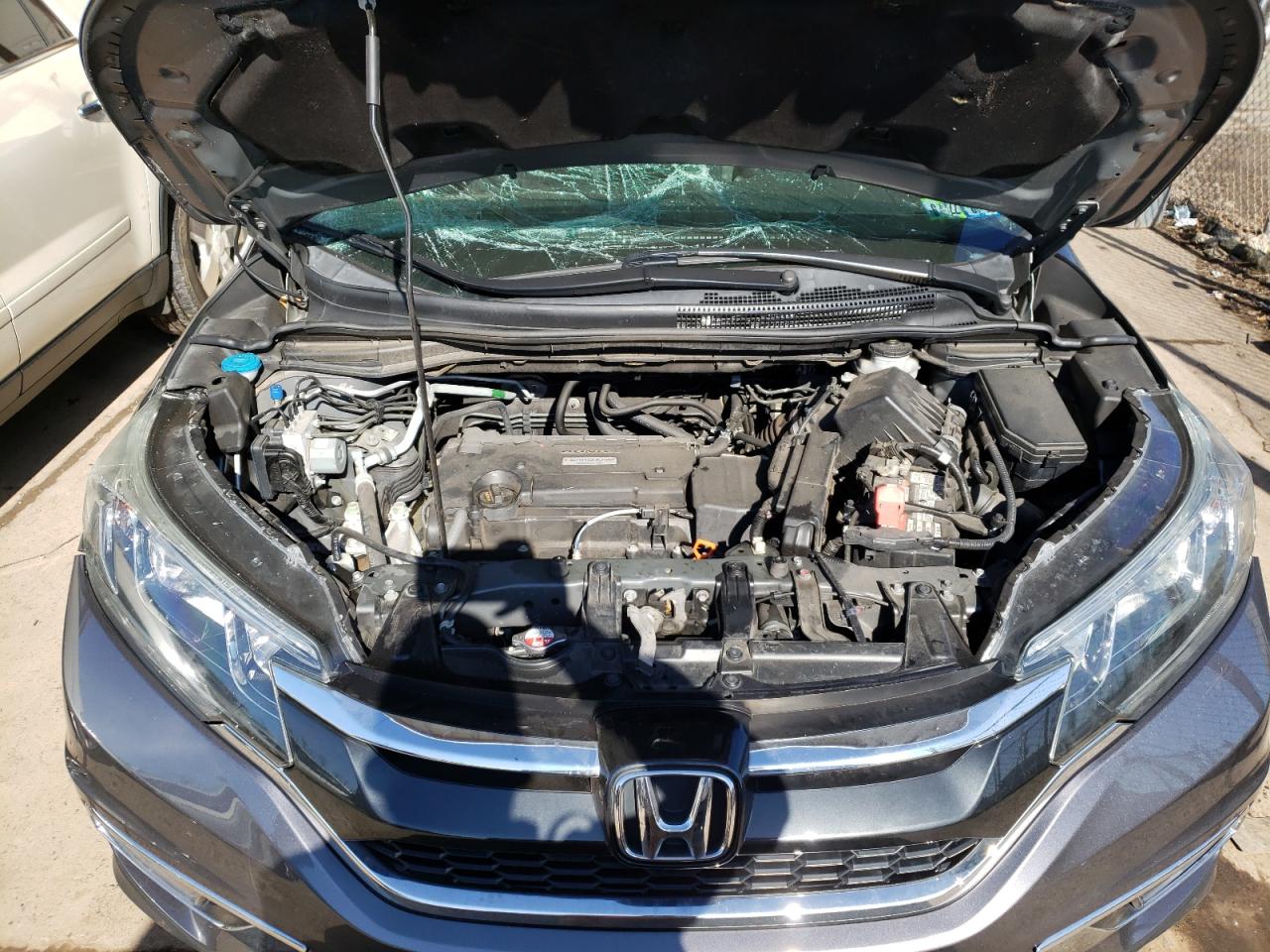 Photo 7 from auction – 2016 HONDA CR-V EX with VIN 2HKRM4H53GH698801