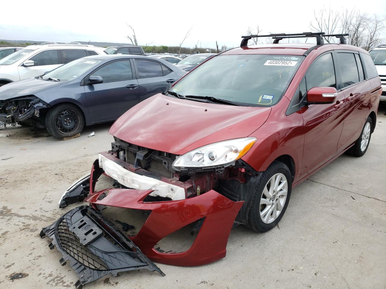 Photo 2 from auction – 2014 MAZDA 5 SPORT with VIN JM1CW2BL4E0168259