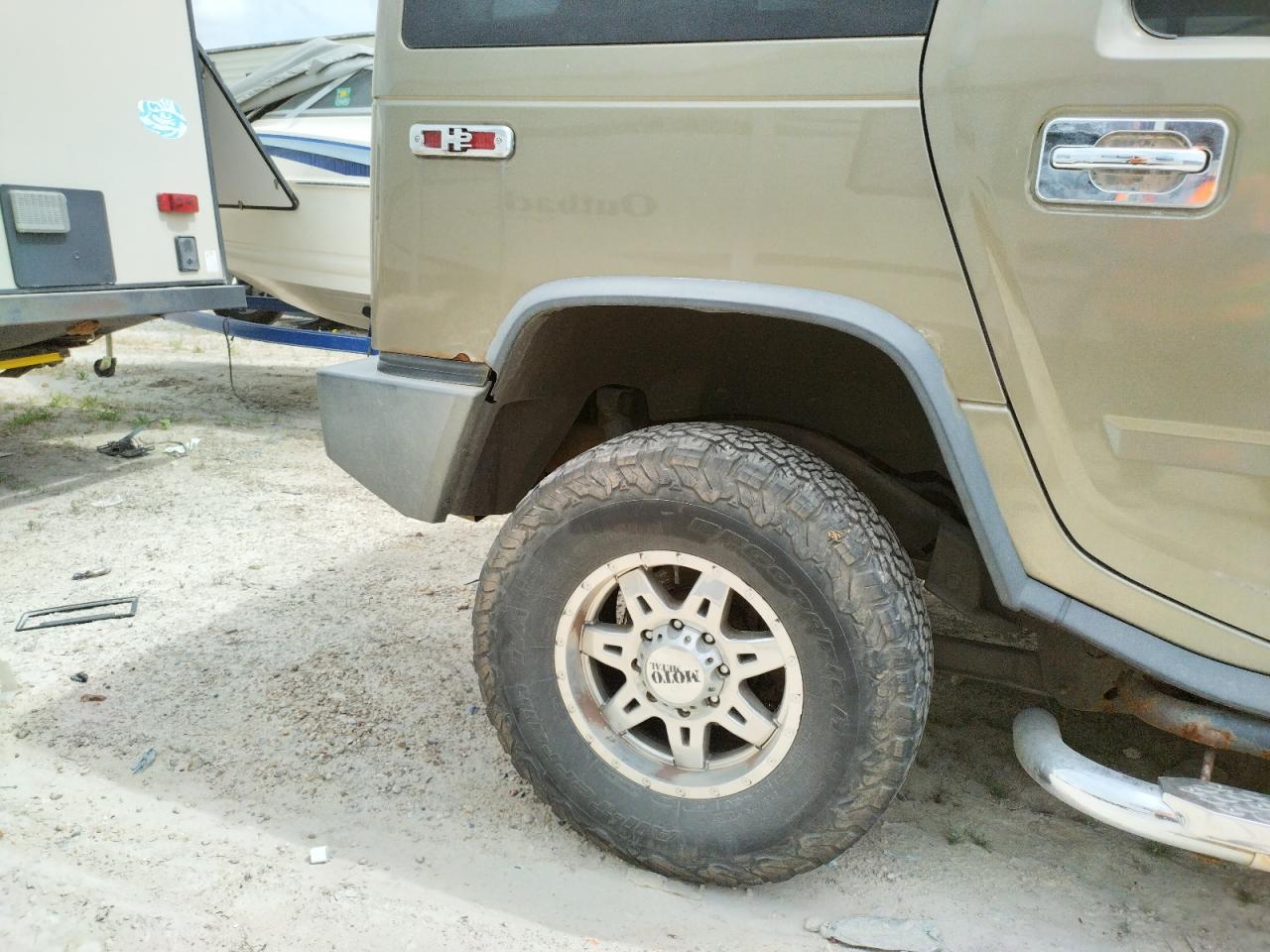 Photo 9 from auction – 2005 HUMMER H2 with VIN 5GRGN23U75H111193