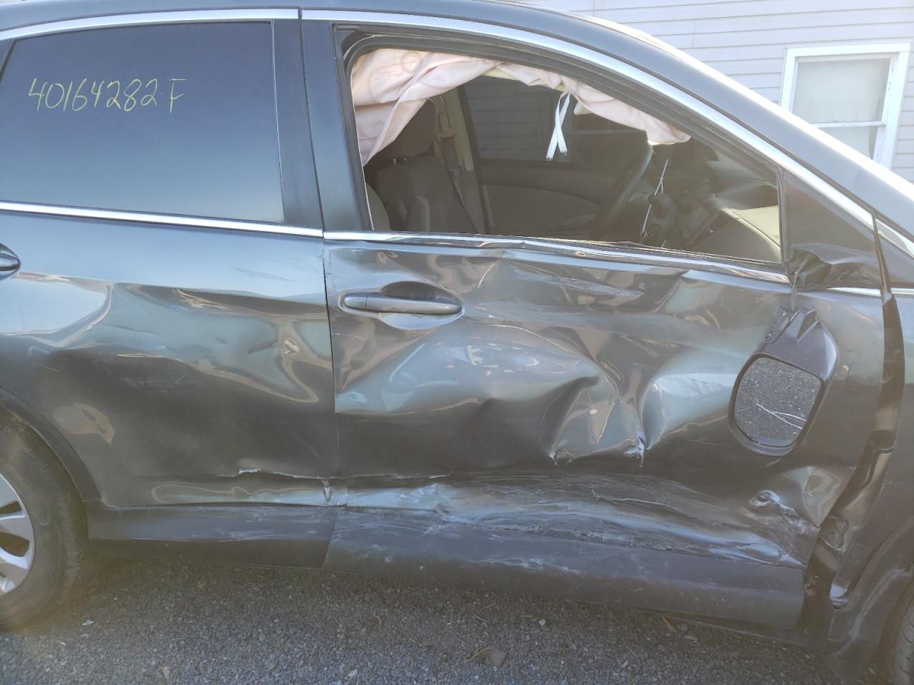 Photo 9 from auction – 2014 HONDA CR-V EX with VIN 5J6RM4H54EL064867