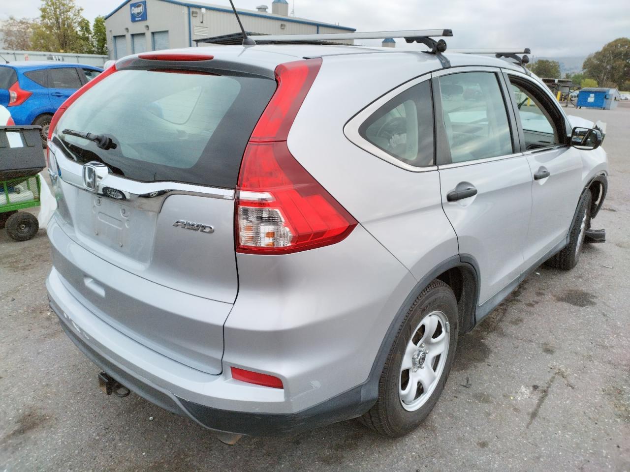 Photo 4 from auction – 2016 HONDA CR-V LX with VIN 2HKRM4H36GH660879