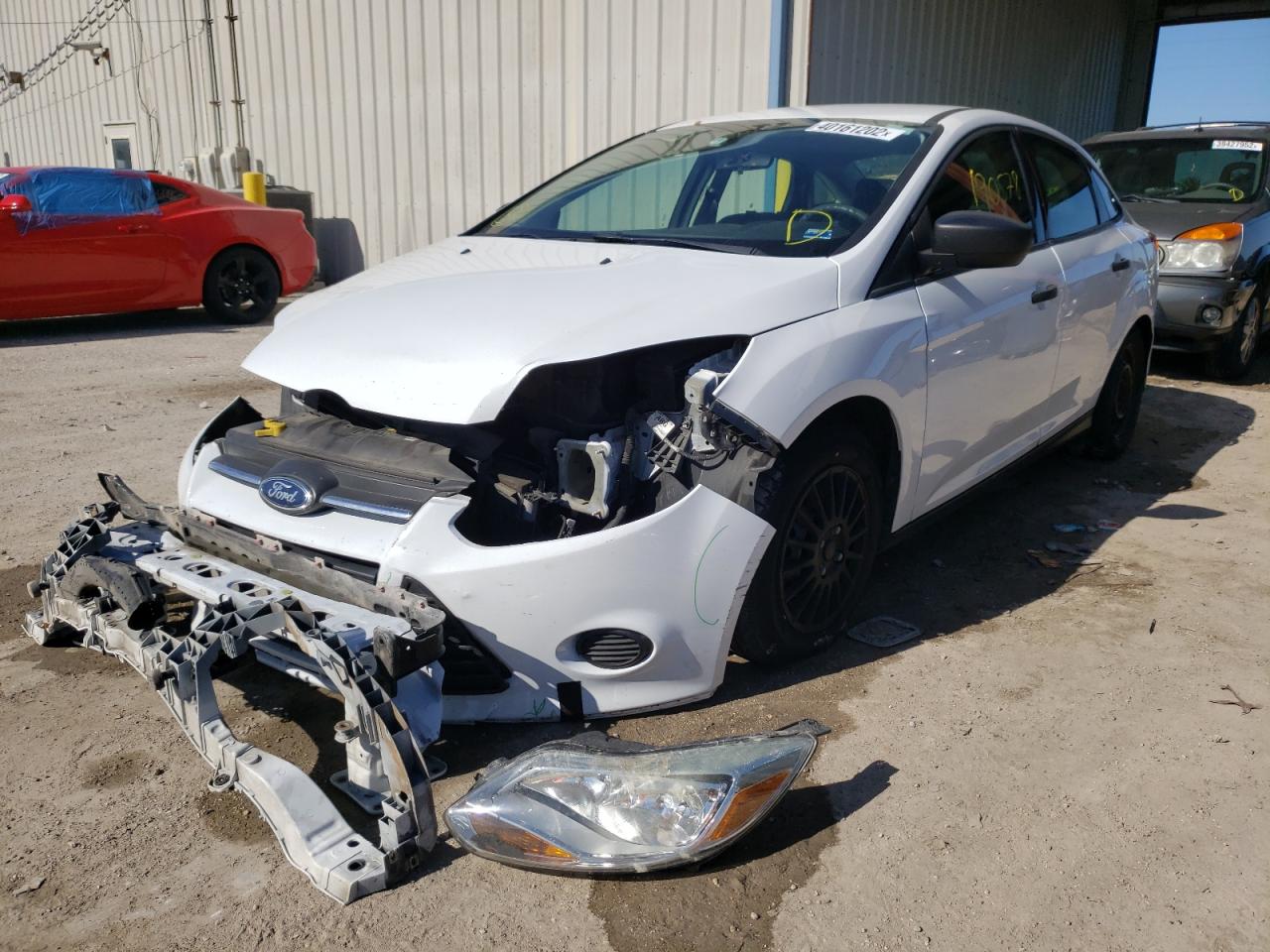 Photo 2 from auction – 2013 FORD FOCUS S with VIN 1FADP3E23DL352315