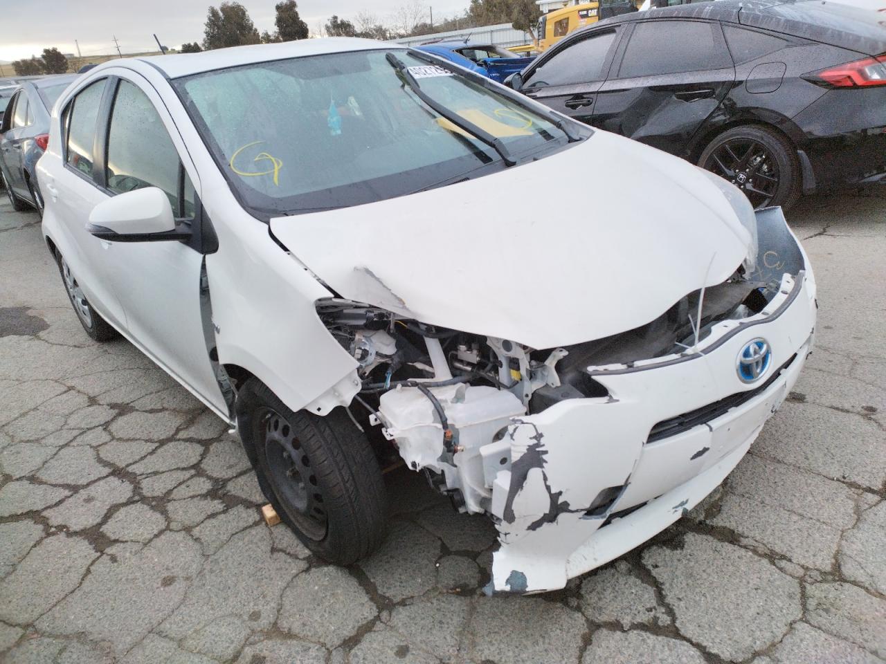 TOYOTA PRIUS C 2014 with VIN JTDKDTB38E1564809 - Photo from auction