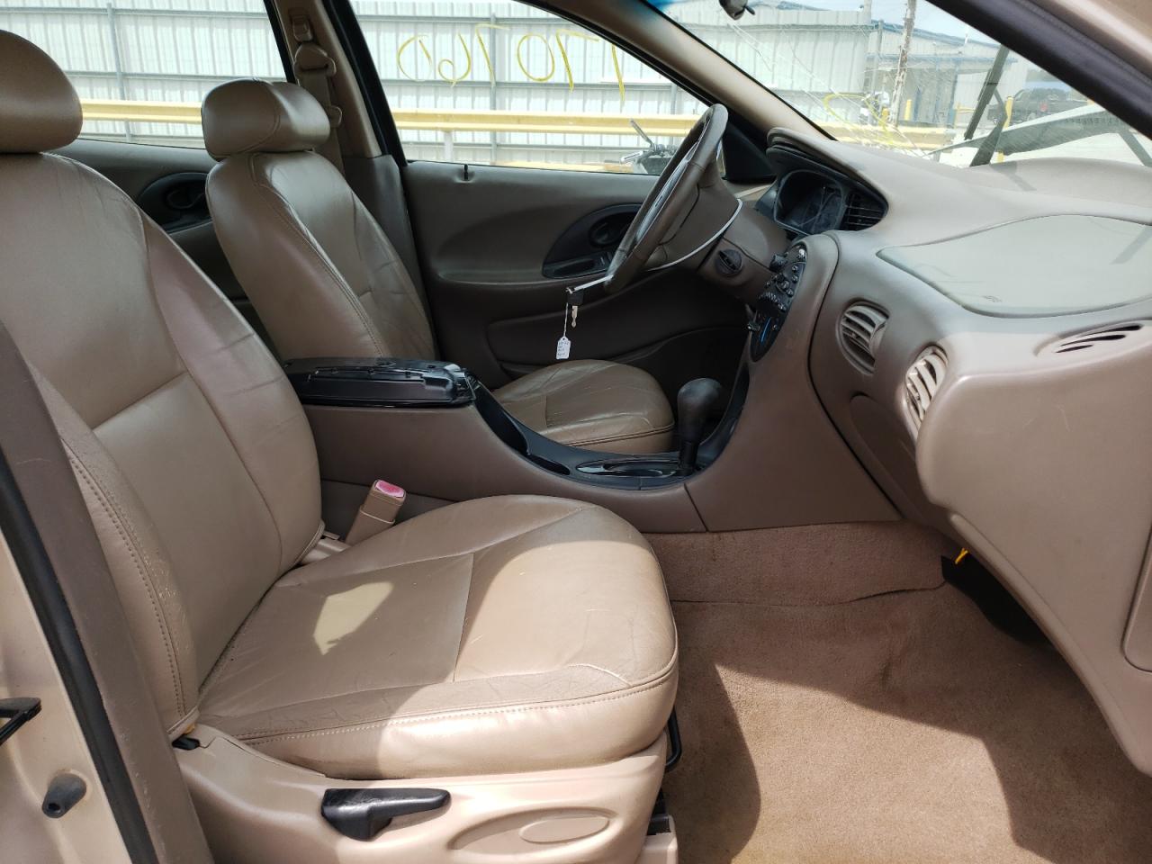 Photo 5 from auction – 1999 FORD TAURUS SE with VIN 1FAFP53S3XA239262