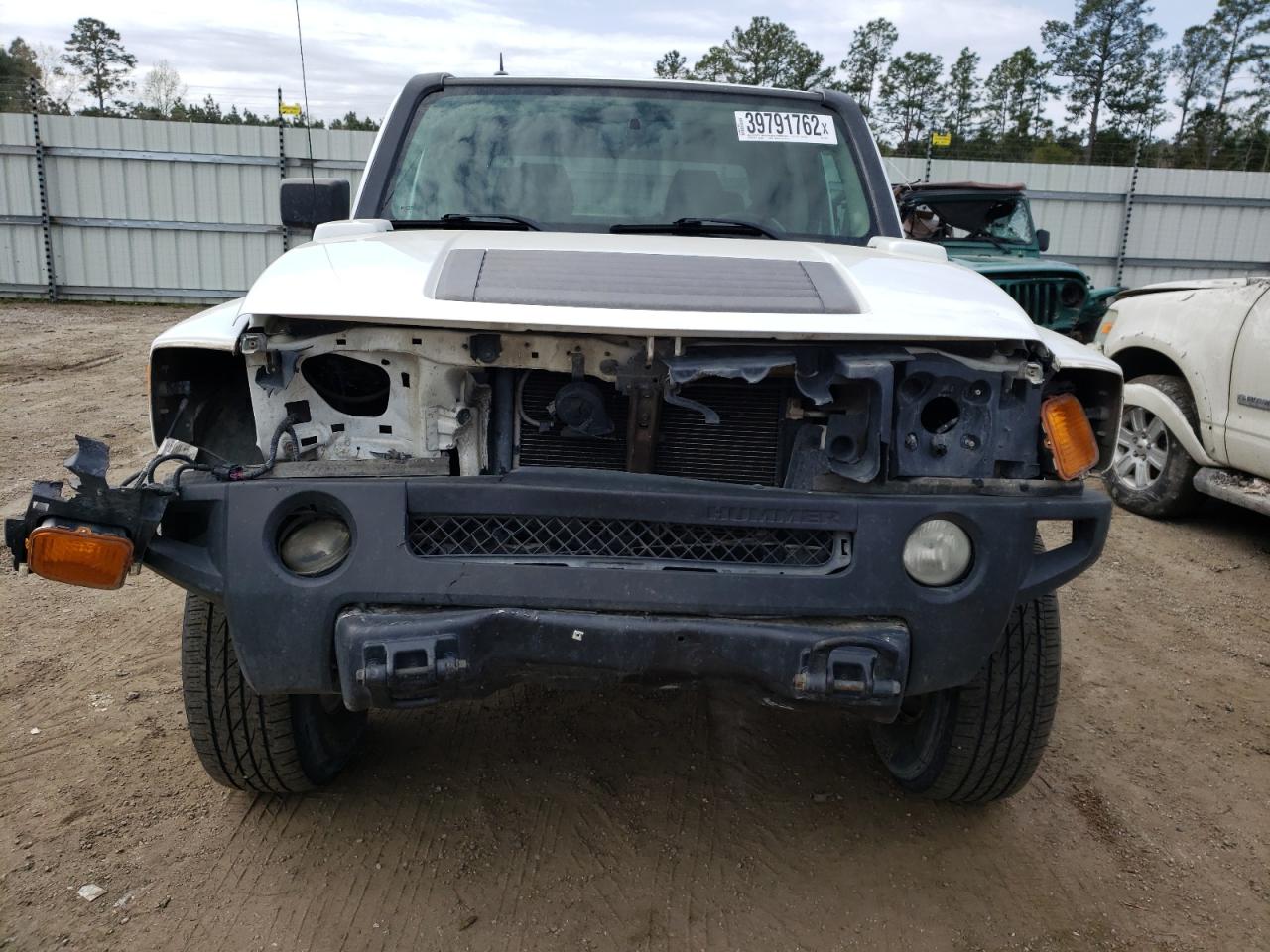 Photo 9 from auction – 2009 HUMMER H3T with VIN 5GNEN13E998116249