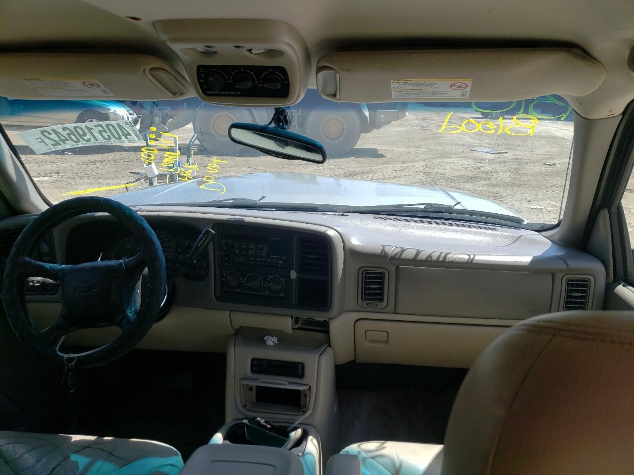 Photo 9 from auction – 2002 GMC YUKON with VIN 1GKEC13V42R188826