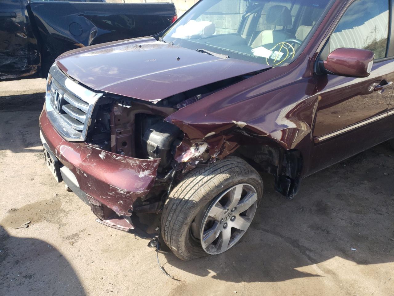 Photo 9 from auction – 2014 HONDA PILOT with VIN 5FNYF4H90EB046318