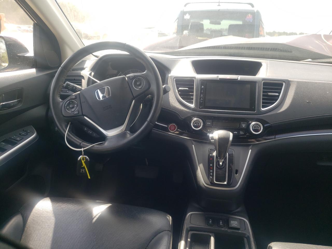 Photo 9 from auction – 2016 HONDA CR-V EXL with VIN 2HKRM3H73GH515182