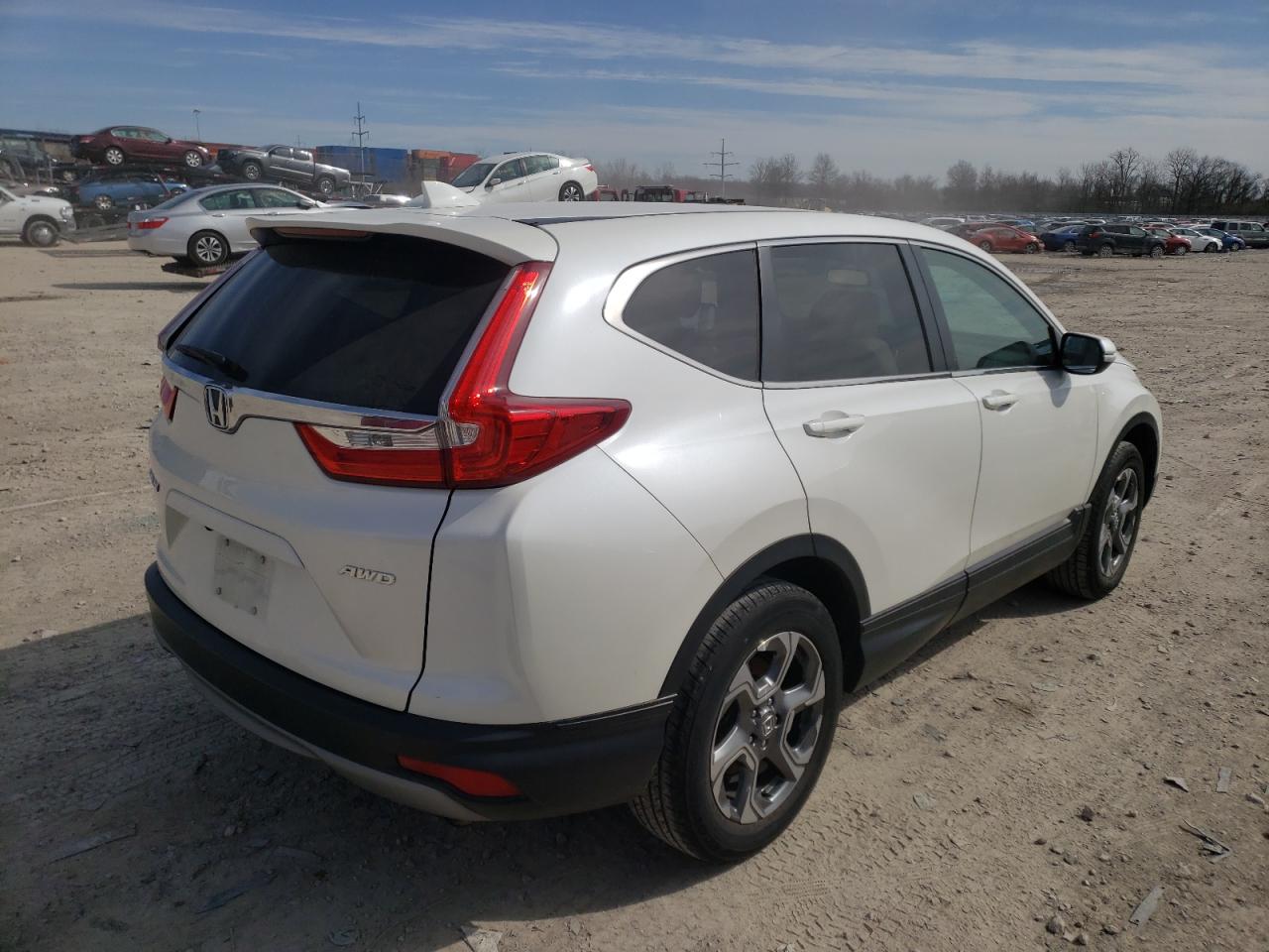 Photo 4 from auction – 2018 HONDA CR-V EXL with VIN 5J6RW2H83JL024086