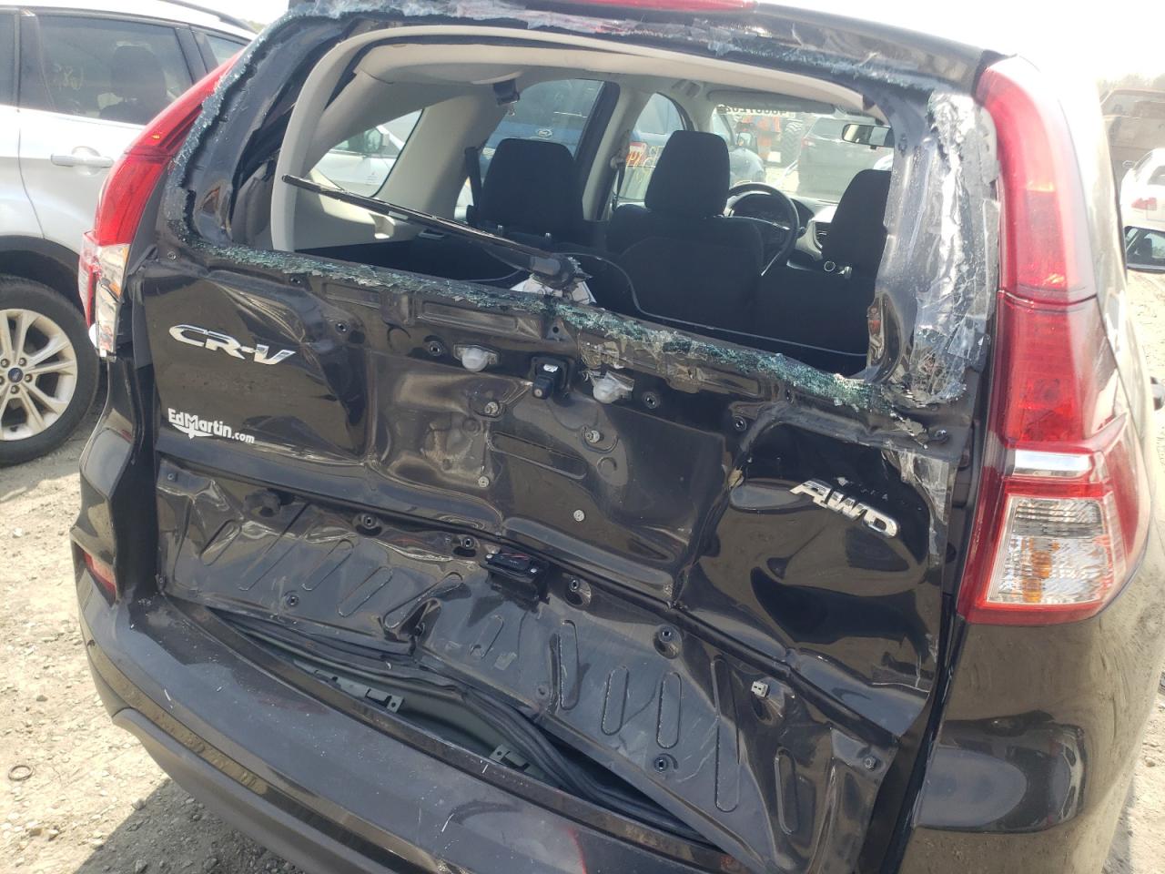 Photo 9 from auction – 2015 HONDA CR-V LX with VIN 5J6RM4H32FL093607