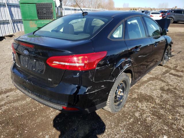 Photo 4 from auction – 2017 FORD FOCUS SE with VIN 1FADP3F28HL329827