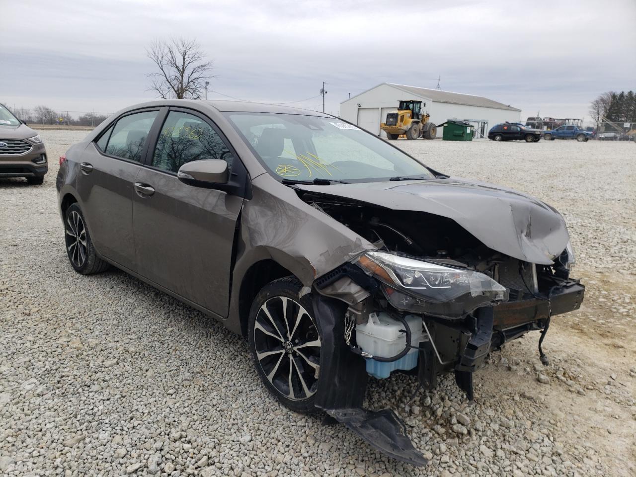 TOYOTA COROLLA L 2017 with VIN 5YFBURHE5HP643138 - Photo from auction
