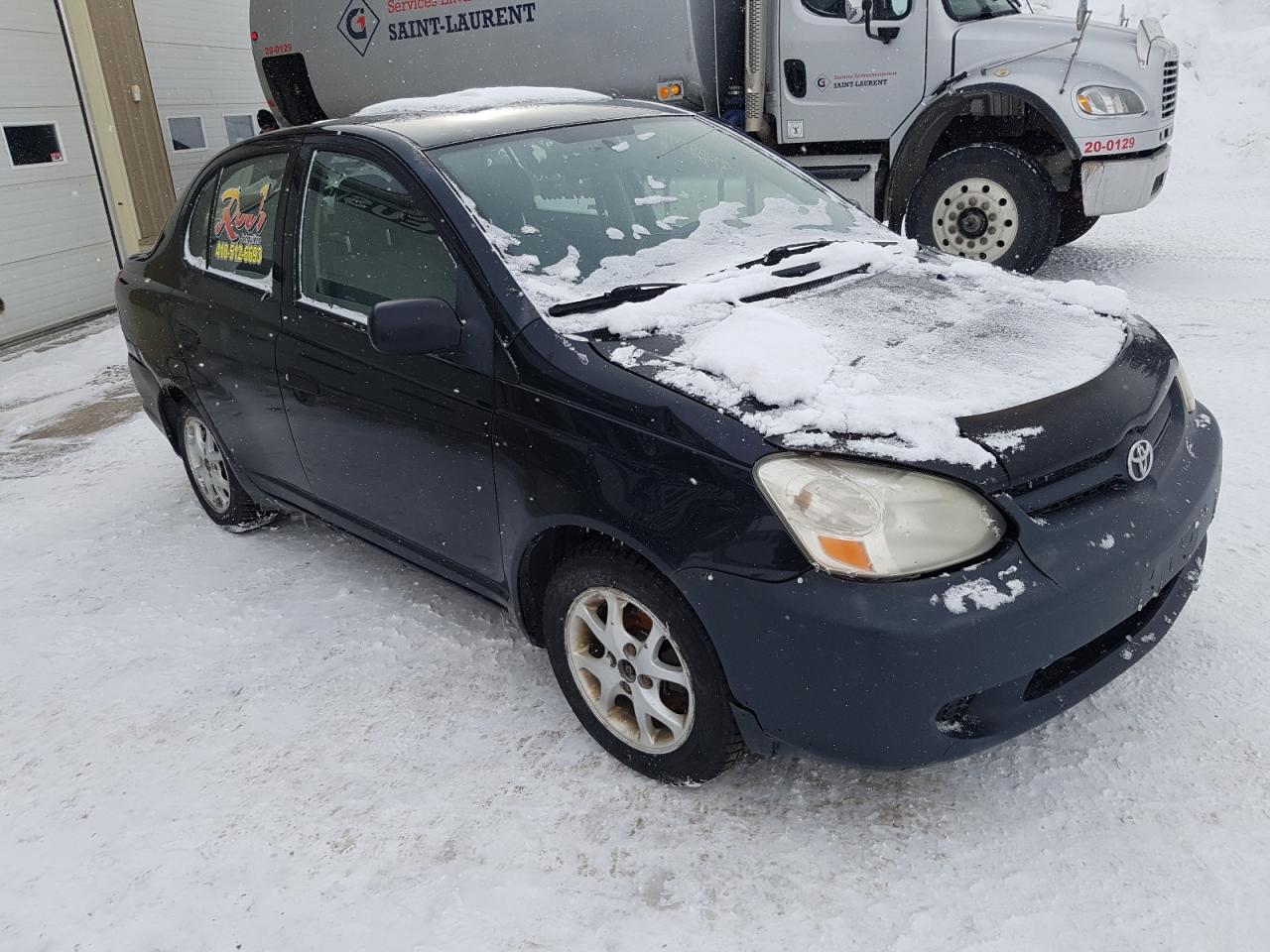 TOYOTA ECHO 2005 with VIN JTDBT123350390516 - Photo from auction
