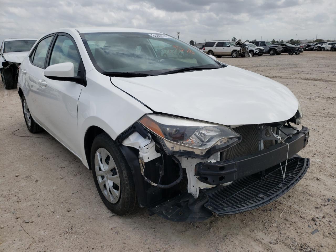TOYOTA COROLLA L 2016 with VIN 5YFBURHE5GP510975 - Photo from auction