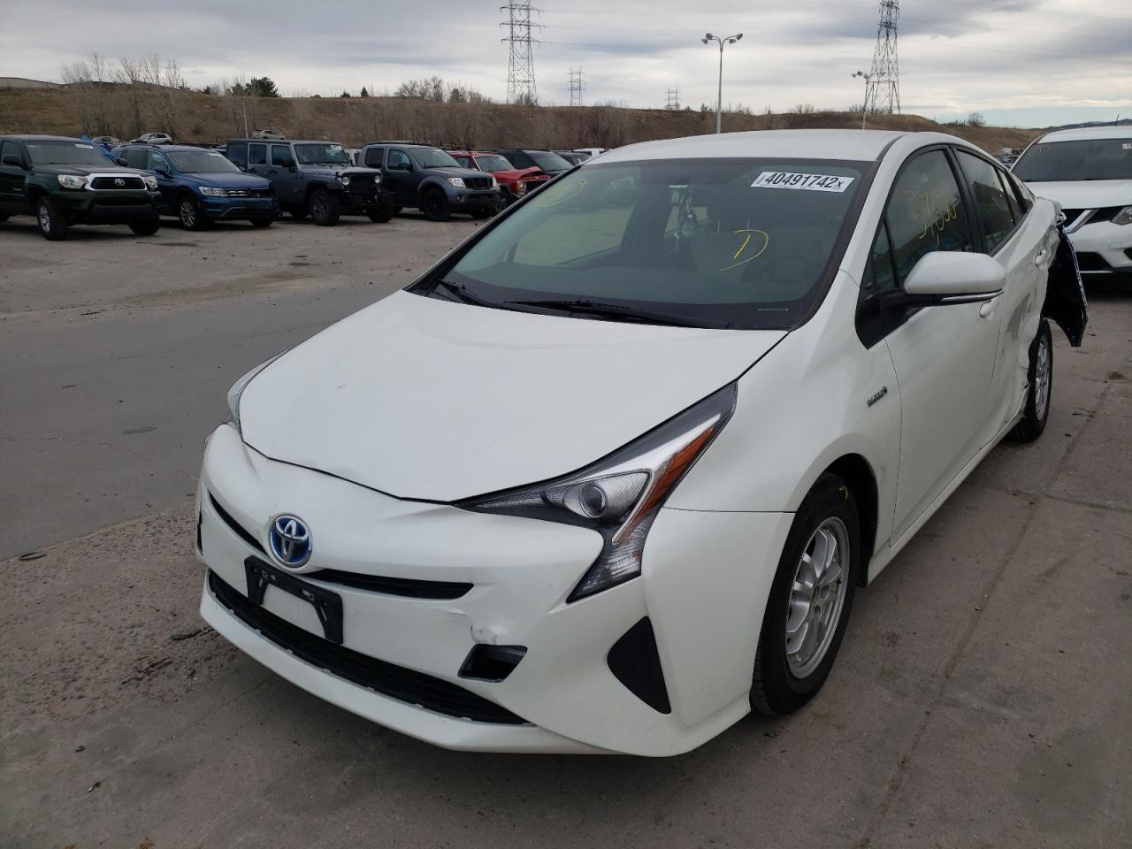 Photo 2 from auction – 2016 TOYOTA PRIUS with VIN JTDKBRFU2G3009664