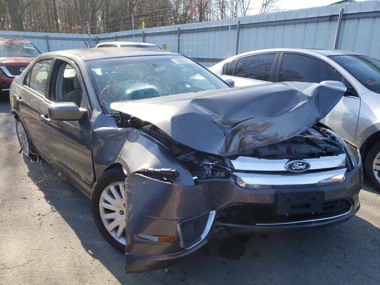 FORD FUSION HYB 2011 with VIN 3FADP0L36BR129727 - Photo from auction